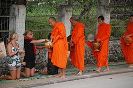 buddhist-monks-collecting-alms-laos-thumbnail