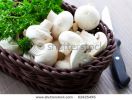 fresh-mushroom-in-basket-with-knife-62425495-thumbnail