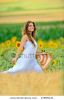 young-woman-on-field-in-summer-47898121-thumbnail
