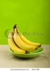 bananas-in-a-green-plate-2017789-thumbnail