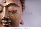wooden-buddha-face-53512447-thumbnail