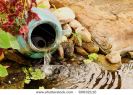 clay-water-feature-near-a-pond-60632110-thumbnail