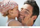 little-girl-kissing-a-man-on-the-cheek-thumbnail