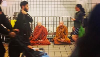 Meditating in a New York subway station. Photos courtesy of Buddhist Insights