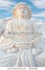sitting-buddha-is-made-of-sand-34183240-thumbnail